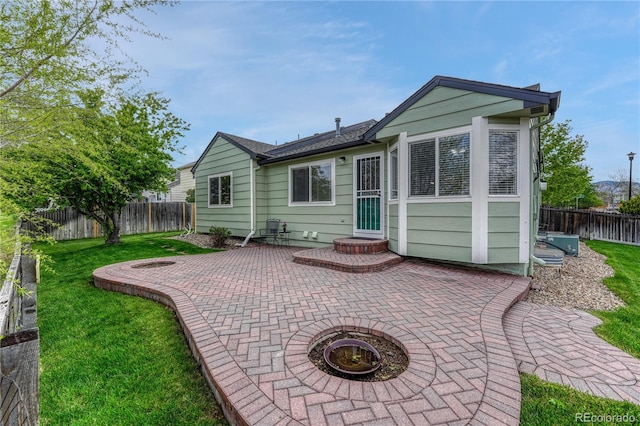5350 S Quail Way, Littleton, CO 80127 - rear view of property featuring a patio area and a fire pit