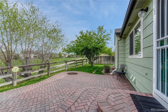 5350 S Quail Way, Littleton, CO 80127 - view of patio / terrace featuring a fenced backyard and an outdoor fire pit