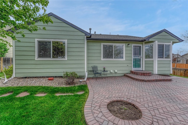 5350 S Quail Way, Littleton, CO 80127 - rear view of property featuring a patio and a shingled roof