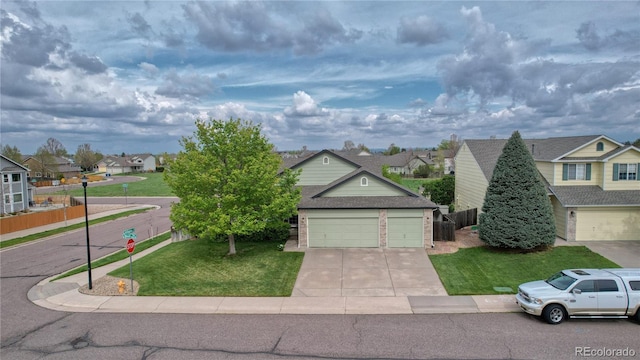 5350 S Quail Way, Littleton, CO 80127 - view of front of property with a residential view, concrete driveway, a garage, and a shingled roof