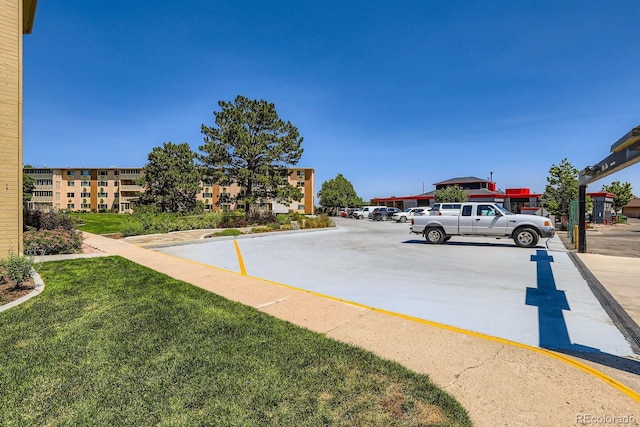 350 S Clinton St Unit 9B, Denver, CO 80247 - view of uncovered parking lot