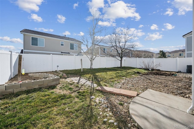 view of yard featuring a fenced backyard