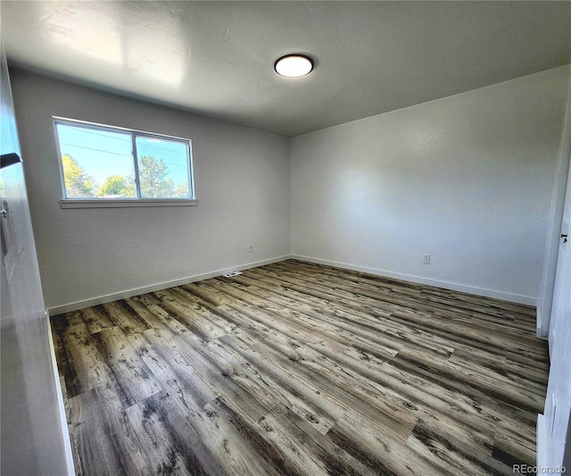 16800 E Bails Pl, Aurora, CO 80017 - unfurnished room featuring wood finished floors and baseboards