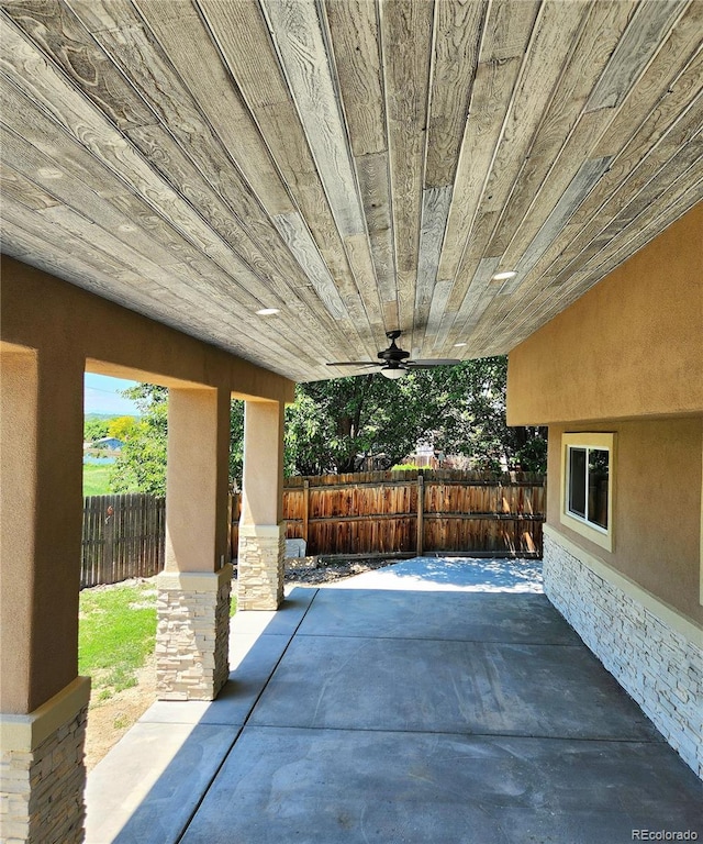 16800 E Bails Pl, Aurora, CO 80017 - fenced backyard with ceiling fan and a patio