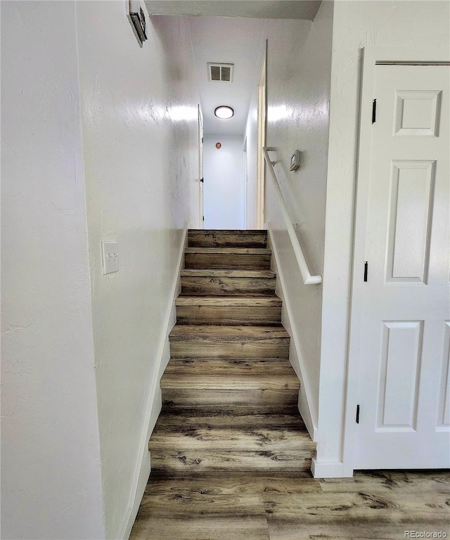 16800 E Bails Pl, Aurora, CO 80017 - stairs featuring wood finished floors and baseboards