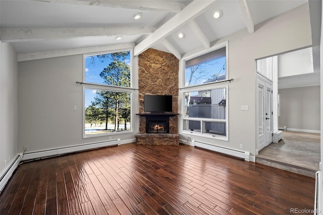 unfurnished living room featuring a fireplace, a baseboard heating unit, and hardwood / wood-style flooring