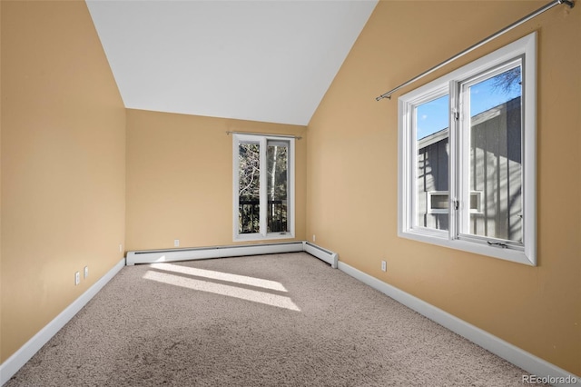 carpeted spare room with lofted ceiling, baseboards, and a baseboard radiator