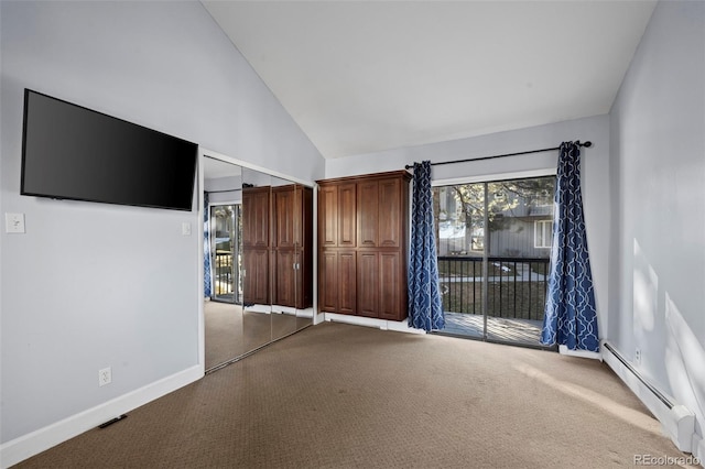 unfurnished living room with a baseboard heating unit, carpet flooring, baseboards, and high vaulted ceiling