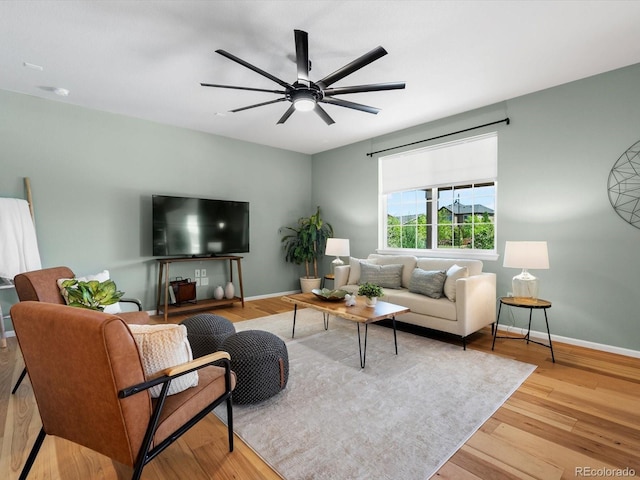 800 Boulder Peak Ave, Erie, CO 80516 - living area with wood finished floors and ceiling fan