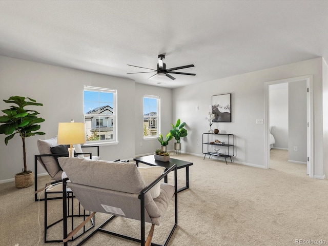 800 Boulder Peak Ave, Erie, CO 80516 - carpeted living area with ceiling fan and baseboards