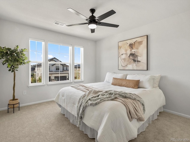 800 Boulder Peak Ave, Erie, CO 80516 - bedroom with light colored carpet and ceiling fan