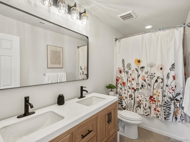 800 Boulder Peak Ave, Erie, CO 80516 - bathroom featuring tile patterned flooring, double vanity, and recessed lighting