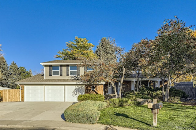 front facade with a front yard and a garage