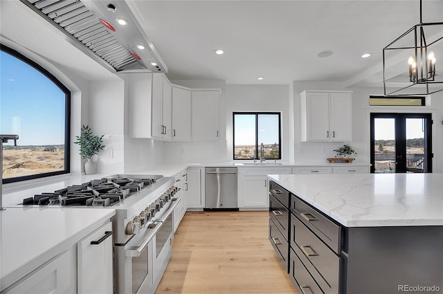 8700 Lost Lake Dr, Franktown, CO 80116 - kitchen featuring recessed lighting, plenty of natural light, and stainless steel appliances