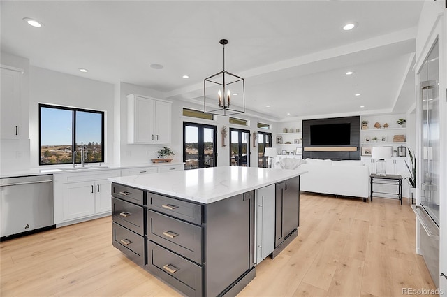8700 Lost Lake Dr, Franktown, CO 80116 - kitchen with white cabinets, recessed lighting, light wood finished floors, a sink, and appliances with stainless steel finishes