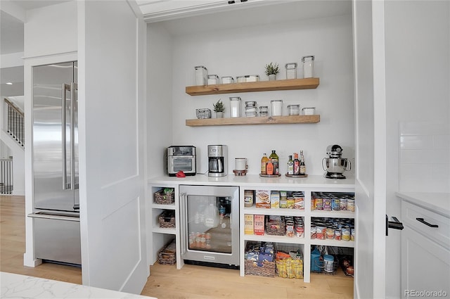 8700 Lost Lake Dr, Franktown, CO 80116 - pantry featuring wine cooler