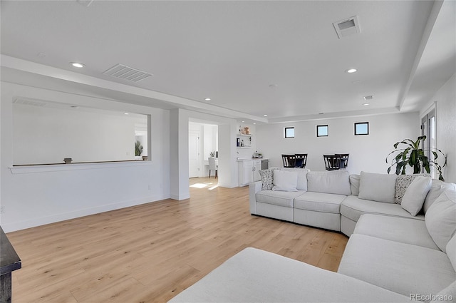 8700 Lost Lake Dr, Franktown, CO 80116 - living area featuring baseboards, light wood finished floors, visible vents, and recessed lighting