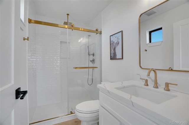8700 Lost Lake Dr, Franktown, CO 80116 - full bathroom featuring toilet, vanity, and a stall shower