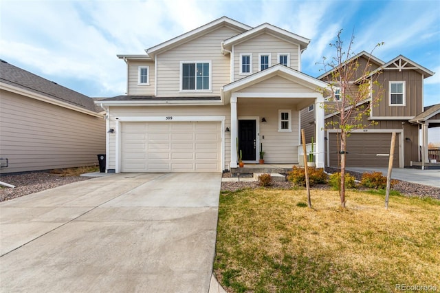 view of front of home with a garage, driveway, and a front yard