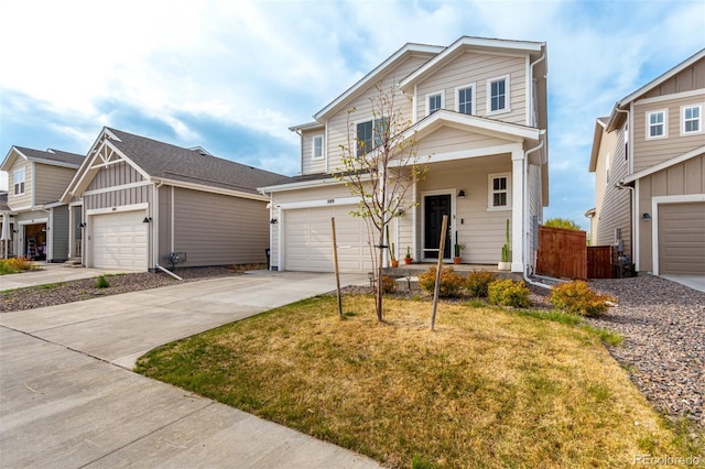 view of front facade with driveway, a garage, and fence