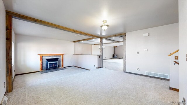 321 Stockton Ct, Gilcrest, CO 80623 - unfurnished living room with carpet floors and baseboards