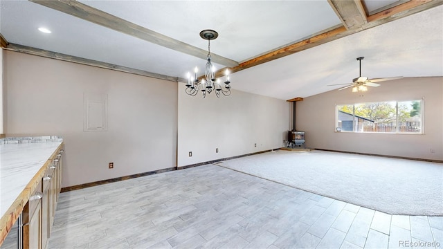 321 Stockton Ct, Gilcrest, CO 80623 - unfurnished dining area with a wood stove, light wood-type flooring, baseboards, and ceiling fan