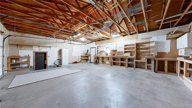 321 Stockton Ct, Gilcrest, CO 80623 - garage featuring a garage door opener