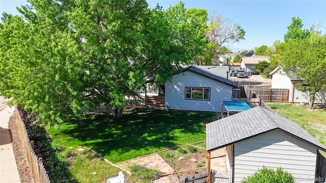 321 Stockton Ct, Gilcrest, CO 80623 - view of front of home with stairs and roof with shingles