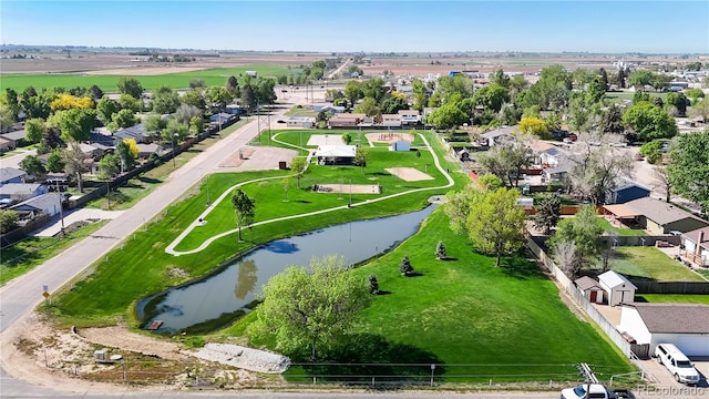 321 Stockton Ct, Gilcrest, CO 80623 - aerial perspective of suburban area with a large body of water