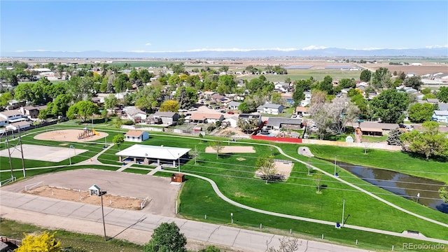 321 Stockton Ct, Gilcrest, CO 80623 - aerial perspective of suburban area with a large body of water