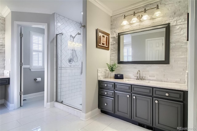 bathroom with backsplash, ornamental molding, vanity, an enclosed shower, and tile patterned floors