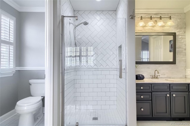 bathroom with toilet, a shower with shower door, crown molding, vanity, and decorative backsplash