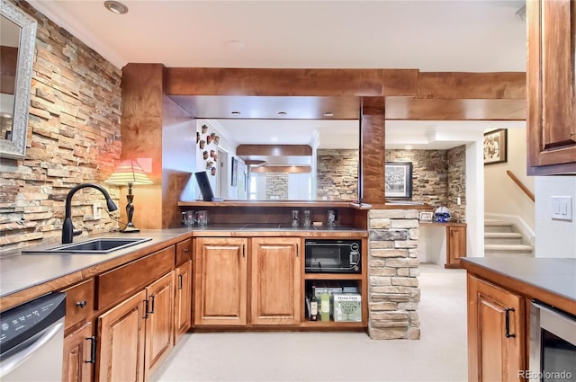 kitchen with black microwave, sink, stainless steel dishwasher, and beverage cooler