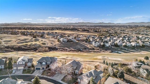 birds eye view of property featuring a mountain view