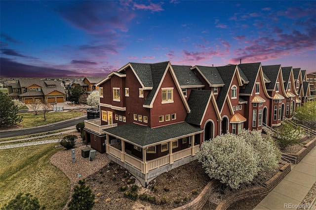 18348 French Creek Ave, Parker, CO 80134 - view of front of house featuring stucco siding, roof with shingles, and a residential view