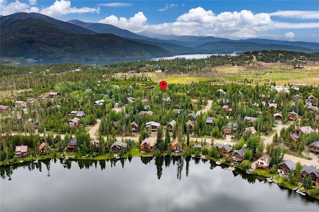 bird's eye view featuring a water and mountain view