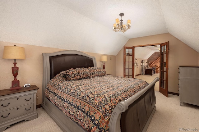 bedroom with baseboards, vaulted ceiling, a chandelier, a textured ceiling, and light colored carpet