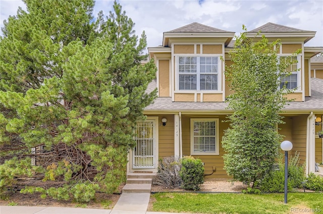 14129 E Dickinson Dr Unit D, Aurora, CO 80014 - view of front facade featuring roof with shingles