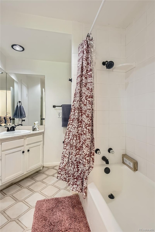 14129 E Dickinson Dr Unit D, Aurora, CO 80014 - full bathroom featuring vanity, shower / bath combo, and tile patterned floors