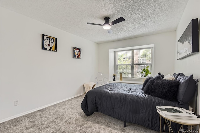 14129 E Dickinson Dr Unit D, Aurora, CO 80014 - bedroom featuring a textured ceiling, carpet floors, and ceiling fan