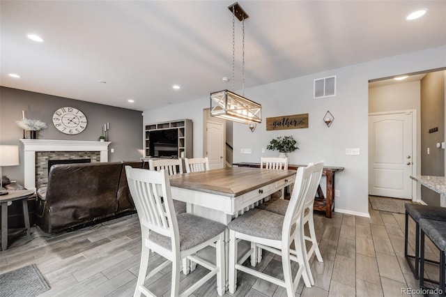 dining room with a fireplace