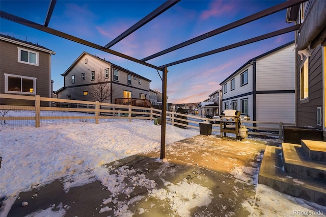 view of yard at dusk