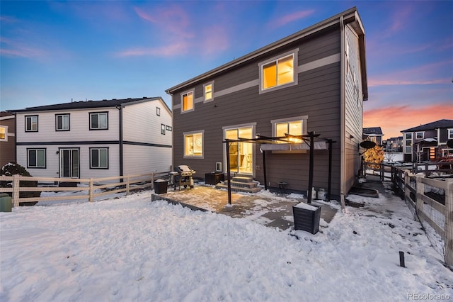 view of snow covered property