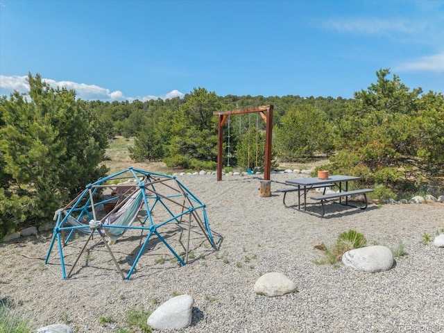 14051 US Highway 285, Salida, CO 81201 - view of playground featuring a wooded view
