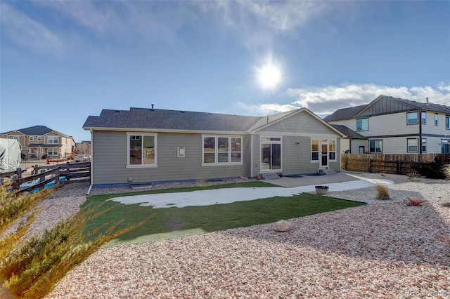 back of property featuring a patio area