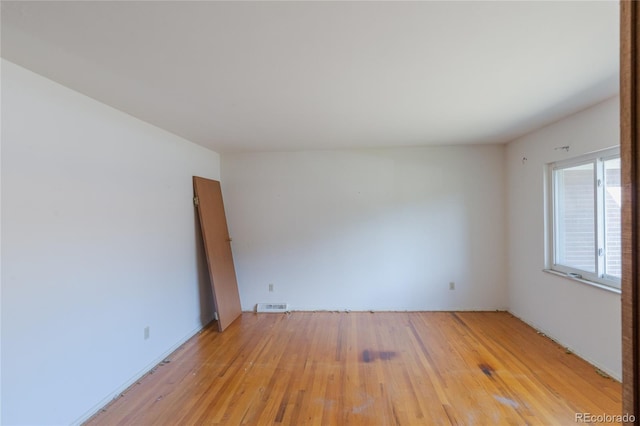 2976 S Magnolia Way, Denver, CO 80224 - empty room featuring light wood-style floors