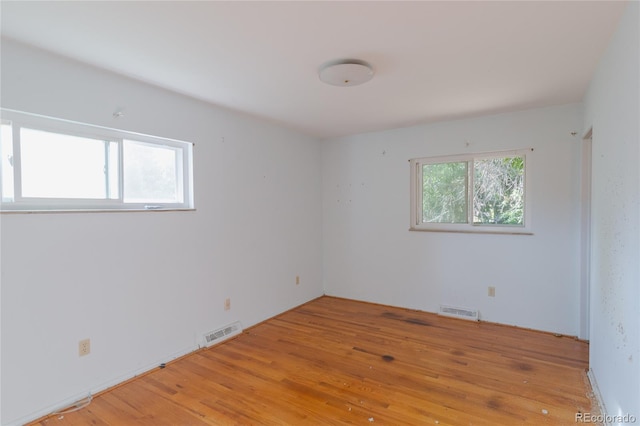 2976 S Magnolia Way, Denver, CO 80224 - spare room with light wood-style floors
