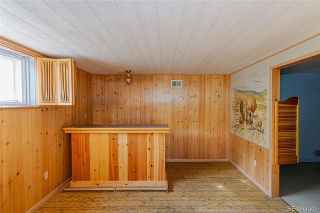 2976 S Magnolia Way, Denver, CO 80224 - bar area with wood finished floors, wood walls, and wood ceiling