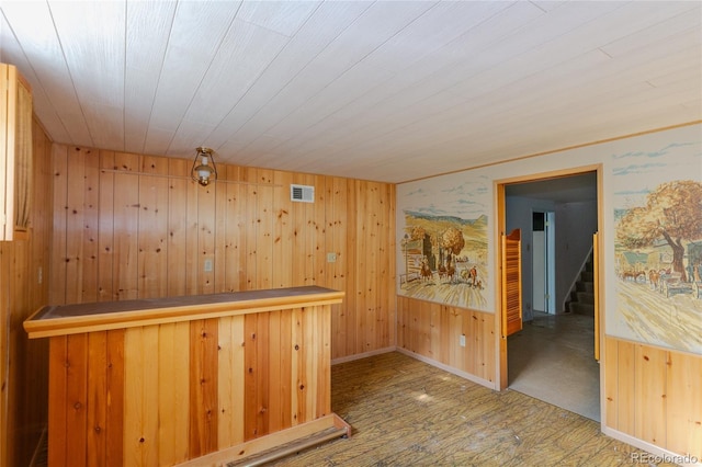 2976 S Magnolia Way, Denver, CO 80224 - indoor dry bar with wooden walls, wood finished floors, and wooden ceiling