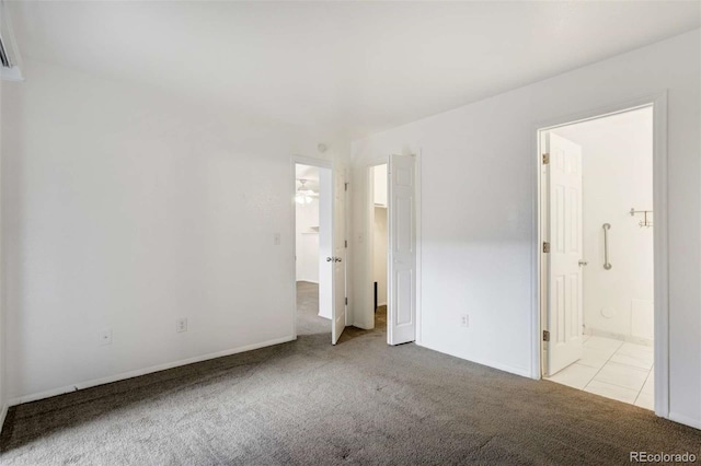 2237 S Buckley Rd Unit 101, Aurora, CO 80013 - unfurnished bedroom with carpet floors and connected bathroom